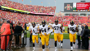 AMES, IA - SEPTEMBER 14: The Iowa Hawkeyes leave the playing field for a lighting delay in the first quarter of play against the Iowa State Cyclones at Jack Trice Stadium on September 14, 2019 in Ames, Iowa. (Photo by David Purdy/Getty Images)