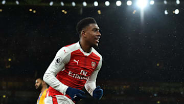 Arsenal's Nigerian striker Alex Iwobi celebrates scoring his team's second goal during the English Premier League football match between Arsenal and Crystal Palace at the Emirates Stadium in London on January 1, 2017. / AFP / Glyn KIRK / RESTRICTED TO EDITORIAL USE. No use with unauthorized audio, video, data, fixture lists, club/league logos or 'live' services. Online in-match use limited to 75 images, no video emulation. No use in betting, games or single club/league/player publications. / (Photo credit should read GLYN KIRK/AFP/Getty Images)