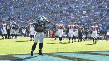Dec 13, 2015; Charlotte, NC, USA; Carolina Panthers quarterback Cam Newton (1) does the dab dance after the Panthers score a touchdown in the first quarter at Bank of America Stadium. Mandatory Credit: Bob Donnan-USA TODAY Sports