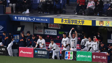 OSAKA, JAPAN - MARCH 06: Japanese players celebrate as Designated hitter Shohei Ohtani #16 (not pictured) hits a three run home run in the fifth inning during the World Baseball Classic exhibition game between Japan and Hanshin Tigers at Kyocera Dome Osaka on March 6, 2023 in Osaka, Japan. (Photo by Kenta Harada/Getty Images)