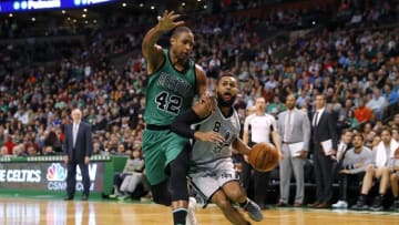 Nov 25, 2016; Boston, MA, USA; San Antonio Spurs guard Patty Mills (8) tries to get past Boston Celtics center Al Horford (42) during the second half of the San Antonio Spurs 109-103 win over the Boston Celtics at TD Garden. Mandatory Credit: Winslow Townson-USA TODAY Sports