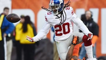 Nov 27, 2016; Cleveland, OH, USA; New York Giants cornerback Janoris Jenkins (20) almost intercepts a pass intended for Cleveland Browns wide receiver Corey Coleman (19) during the second half at FirstEnergy Stadium. Mandatory Credit: Ken Blaze-USA TODAY Sports