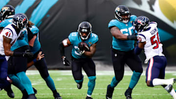 JACKSONVILLE, FLORIDA - NOVEMBER 08: James Robinson #30 of the Jacksonville Jaguars runs the ball during the first half against the Houston Texans at TIAA Bank Field on November 08, 2020 in Jacksonville, Florida. (Photo by Douglas P. DeFelice/Getty Images)