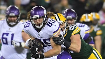 GREEN BAY, WI - DECEMBER 23: David Morgan #89 of the Minnesota Vikings is brought down by Kyler Fackrell #51 of the Green Bay Packers during the second half at Lambeau Field on December 23, 2017 in Green Bay, Wisconsin. The Vikings defeated the Packers 16-0. (Photo by Stacy Revere/Getty Images)
