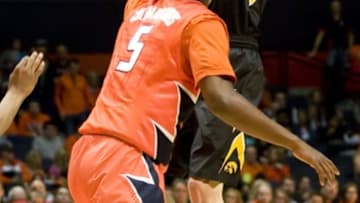 Feb 7, 2016; Champaign, IL, USA; Iowa Hawkeyes forward Jarrod Uthoff (20) shoots over Illinois Fighting Illini guard Jalen Coleman-Lands (5) during the second half at State Farm Center. Iowa beat Illinois 77 to 65. Mandatory Credit: Mike Granse-USA TODAY Sports