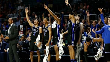 MIAMI, FLORIDA - JANUARY 04: Tre Jones #3, Cassius Stanley #2, Vernon Carey Jr. #1, Wendell Moore Jr. #0 and Javin DeLaurier #12 of the Duke Blue Devils react after a basket against the Miami Hurricanes during the second half at the Watsco Center on January 04, 2020 in Miami, Florida. (Photo by Michael Reaves/Getty Images)