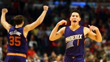 Dec 7, 2015; Chicago, IL, USA; Phoenix Suns guard Devin Booker (1) and forward Mirza Teletovic (35) react after defeating the Chicago Bulls at United Center. Mandatory Credit: Caylor Arnold-USA TODAY Sports