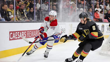 LAS VEGAS, NEVADA - OCTOBER 30: Juraj Slafkovsky #20 of the Montreal Canadiens skates with the puck against Kaedan Korczak #6 of the Vegas Golden Knights in the first period of their game at T-Mobile Arena on October 30, 2023 in Las Vegas, Nevada. The Golden Knights defeated the Canadiens 3-2 in a shootout. (Photo by Ethan Miller/Getty Images)