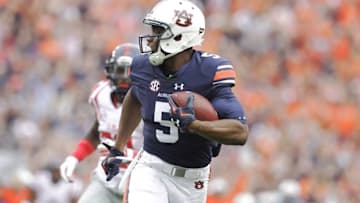 Oct 31, 2015; Auburn, AL, USA; Auburn Tigers receiver Ricardo Louis (5) scores a touchdown against the Ole Miss Rebels during the second quarter at Jordan Hare Stadium. Mandatory Credit: John Reed-USA TODAY Sports