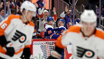 Nov 26, 2022; Elmont, New York, USA; New York Islanders left wing Zach Parise (11) celebrates his goal against the Philadelphia Flyers with Islanders right wing Oliver Wahlstrom (26) during the second period at UBS Arena. Mandatory Credit: Brad Penner-USA TODAY Sports