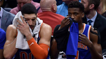 SALT LAKE CITY, UT - DECEMBER 29: Enes Kanter #00 and Emmanuel Mudiay #1 of the New York Knicks sit on the bench late in their 129-97 loss to the Utah Jazz in the second half of a NBA game at Vivint Smart Home Arena on December 29, 2018 in Salt Lake City, Utah. NOTE TO USER: User expressly acknowledges and agrees that, by downloading and or using this photograph, User is consenting to the terms and conditions of the Getty Images License Agreement. (Photo by Gene Sweeney Jr./Getty Images)