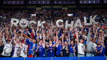 Nov 10, 2023; Lawrence, Kansas, USA; Kansas Jayhawks fans cheer prior to a game against the Manhattan Jaspers at Allen Fieldhouse. Mandatory Credit: Jay Biggerstaff-USA TODAY Sports