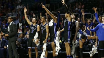 MIAMI, FLORIDA - JANUARY 04: Tre Jones #3, Cassius Stanley #2, Vernon Carey Jr. #1, Wendell Moore Jr. #0 and Javin DeLaurier #12 of the Duke Blue Devils react after a basket against the Miami Hurricanes during the second half at the Watsco Center on January 04, 2020 in Miami, Florida. (Photo by Michael Reaves/Getty Images)