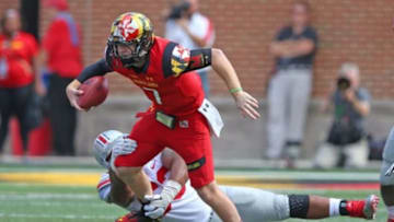 Oct 4, 2014; College Park, MD, USA; Maryland Terrapins quarterback Caleb Rowe (7) is sacked by Ohio State Buckeyes lineman Tracy Sprinkle (93) at Byrd Stadium. Mandatory Credit: Mitch Stringer-USA TODAY Sports