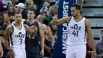 Nov 25, 2016; Salt Lake City, UT, USA; Utah Jazz guard George Hill (3) and forward Trey Lyles (41) react during the second half against the Atlanta Hawks at Vivint Smart Home Arena. The Jazz won 95-68. Mandatory Credit: Russ Isabella-USA TODAY Sports