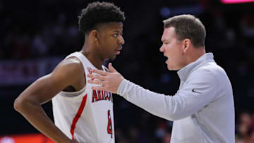 TUCSON, ARIZONA - NOVEMBER 27: Head coach Tommy Lloyd of the Arizona Wildcats talks to guard Dalen Terry #4 of the Arizona Wildcats during the first half of the NCAAB game at McKale Center on November 27, 2021 in Tucson, Arizona. The Arizona Wildcats won 105-59 against the Sacramento State Hornets. (Photo by Rebecca Noble/Getty Images)