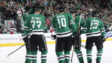DALLAS, TX - JANUARY 4: Marc Methot #33, Martin Hanzal #10, Jason Spezza #90, Mattias Janmark #13 and the Dallas Stars celebrate a goal against the New Jersey Devils at the American Airlines Center on January 4, 2018 in Dallas, Texas. (Photo by Glenn James/NHLI via Getty Images)