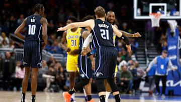 ORLANDO, FLORIDA - DECEMBER 27: LeBron James #6 of the Los Angeles Lakers and Moritz Wagner #21 of the Orlando Magic react prior to the game at Amway Center on December 27, 2022 in Orlando, Florida. NOTE TO USER: User expressly acknowledges and agrees that, by downloading and or using this photograph, User is consenting to the terms and conditions of the Getty Images License Agreement. (Photo by Douglas P. DeFelice/Getty Images)