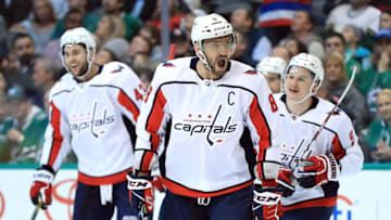 DALLAS, TX - DECEMBER 19: Alex Ovechkin #8 of the Washington Capitals celebrates a goal by Dmitry Orlov #9 in the second period against the Dallas Stars at American Airlines Center on December 19, 2017 in Dallas, Texas. (Photo by Ronald Martinez/Getty Images)
