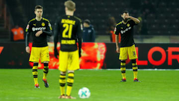 BERLIN, GERMANY - JANUARY 19: Julian Weigl of Dortmund, Andre Schuerrle of Dortmund and Oemer Toprak of Dortmund look dejected during the Bundesliga match between Hertha BSC and Borussia Dortmund at Olympiastadion on January 19, 2018 in Berlin, Germany. (Photo by TF-Images/TF-Images via Getty Images)