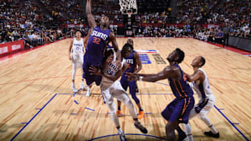 LAS VEGAS, NV - JULY 7: Davon Reed #32 of the Phoenix Suns drives to the basket against the Sacramento Kings during the 2018 Las Vegas Summer League on July 7, 2018 at the Thomas & Mack Center in Las Vegas, Nevada. NOTE TO USER: User expressly acknowledges and agrees that, by downloading and/or using this Photograph, user is consenting to the terms and conditions of the Getty Images License Agreement. Mandatory Copyright Notice: Copyright 2018 NBAE (Photo by Garrett Ellwood/NBAE via Getty Images)