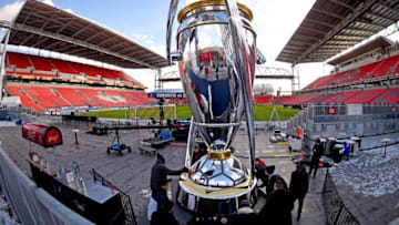 Dec 9, 2016; Toronto, Ontario, USA; Stadium workers position a giant replica of the MLS Cup trophy after training sessions in preparations for the MLS Cup final between Seattle Sounders and Toronto FC at BMO Field. Mandatory Credit: Dan Hamilton-USA TODAY Sports