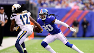 EAST RUTHERFORD, NJ - OCTOBER 08: Travis Benjamin #12 of the Los Angeles Chargers is knocked out of bounds by Janoris Jenkins #20 of the New York Giants in the first quarter during an NFL game at MetLife Stadium on October 8, 2017 in East Rutherford, New Jersey. (Photo by Steven Ryan/Getty Images)