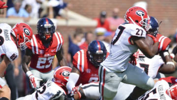 Sep 24, 2016; Oxford, MS, USA; Georgia Bulldogs running back Nick Chubb (27) runs the ball during the second quarter of the game against the Mississippi Rebels at Vaught-Hemingway Stadium. Mandatory Credit: Matt Bush-USA TODAY Sports