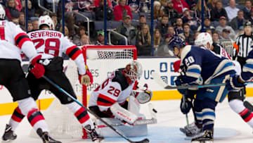 COLUMBUS, OH - DECEMBER 20: Columbus Blue Jackets center Riley Nash (20) attempts a shot as New Jersey Devils goaltender Mackenzie Blackwood (29) defends the goal in a game between the Columbus Blue Jackets and the New Jersey Devils on December 20, 2018 at Nationwide Arena in Columbus, OH. (Photo by Adam Lacy/Icon Sportswire via Getty Images)