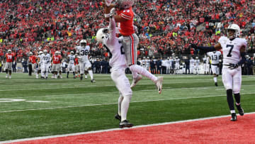COLUMBUS, OH - NOVEMBER 23: Chris Olave #17 of the Ohio State Buckeyes makes the catch for a 28-yard touchdown pass over John Reid #29 of the Penn State Nittany Lions in the fourth quarter at Ohio Stadium on November 23, 2019 in Columbus, Ohio. Ohio State defeated Penn State 28-17. (Photo by Jamie Sabau/Getty Images)