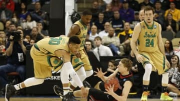 Mar 19, 2015; Pittsburgh, PA, USA; Northeastern Huskies guard David Walker (4) battles for the ball with Notre Dame Fighting Irish forward Zach Auguste (30) during the second half in the second round of the 2015 NCAA Tournament at Consol Energy Center. The Fighting Irish won 69-65. Mandatory Credit: Geoff Burke-USA TODAY Sports