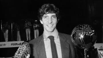 Paolo Rossi holding some silverware. (Mandatory Credit: Italian Football Heroes)