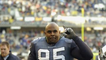 SEATTLE - NOVEMBER 30: Rashad Moore #95 of the Seattle Seahawks walks off the field after the game against the Cleveland Browns on November 30 2003 at Seahawks Stadium in Seattle, Washington. The Seahawks defeated the Browns 34-7. (Photo by Otto Greule Jr/Getty Images)