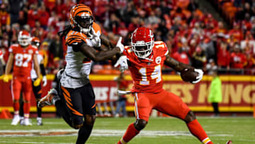 KANSAS CITY, MO - OCTOBER 21: Sammy Watkins #14 of the Kansas City Chiefs stiff arms Dre Kirkpatrick #27 of the Cincinnati Bengals during the first half of the game at Arrowhead Stadium on October 21, 2018 in Kansas City, Kansas. (Photo by Peter Aiken/Getty Images)