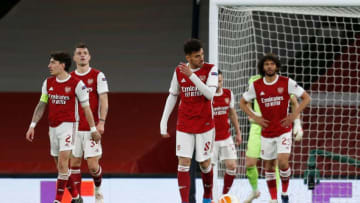 Arsenal players react after Slavia Prague equalised during the UEFA Europa League quarter-final first leg football match between Arsenal and Slavia Prague at the Emirates Stadium in London on April 8, 2021. (Photo by Ian KINGTON / AFP) (Photo by IAN KINGTON/AFP via Getty Images)