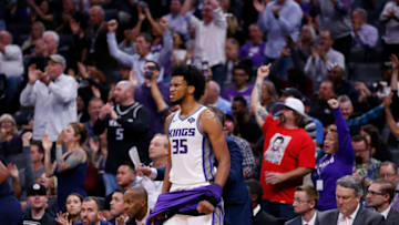 SACRAMENTO, CA - OCTOBER 24: Marvin Bagley III #35 of the Sacramento Kings reacts to a dunk by teammate De'Aaron Fox #5 at Golden 1 Center on October 24, 2018 in Sacramento, California. (Photo by Lachlan Cunningham/Getty Images)
