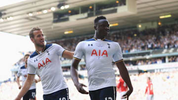 LONDON, ENGLAND - MAY 14: Victor Wanyama of Tottenham Hotspur celebrates scoring his sides first goal with Harry Kane of Tottenham Hotspur during the Premier League match between Tottenham Hotspur and Manchester United at White Hart Lane on May 14, 2017 in London, England. Tottenham Hotspur are playing their last ever home match at White Hart Lane after their 118 year stay at the stadium. Spurs will play at Wembley Stadium next season with a move to a newly built stadium for the 2018-19 campaign. (Photo by Richard Heathcote/Getty Images)
