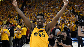 SALT LAKE CITY, UT - APRIL 27: Donovan Mitchell #45 of the Utah Jazz celebrates the Jazz win at the end of Game Six of Round One of the 2018 NBA Playoffs against the Oklahoma City Thunder at Vivint Smart Home Arena on April 27, 2018 in Salt Lake City, Utah. The Jazz beat the Thunder 96-91 to advance to the second round of the NBA Playoffs. NOTE TO USER: User expressly acknowledges and agrees that, by downloading and or using this photograph, User is consenting to the terms and conditions of the Getty Images License Agreement. (Photo by Gene Sweeney Jr./Getty Images)