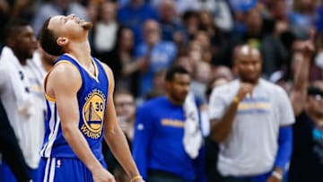 Jan 13, 2016; Denver, CO, USA; Golden State Warriors guard Stephen Curry (30) reacts in the fourth quarter against the Denver Nuggets at the Pepsi Center. The Nuggets defeated the Warriors 112-110. Mandatory Credit: Isaiah J. Downing-USA TODAY Sports