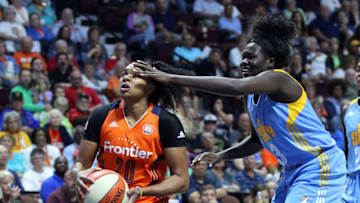 UNCASVILLE, CT - AUGUST 25: Chicago Sky center Adut Bulgak (3) hits Connecticut Sun guard Alex Bentley (20) in the forehead as she drives to the basket during the second half of an WNBA game between Chicago Sky and Connecticut Sun on August 25, 2017, at Mohegan Sun Arena in Uncasville, CT. Chicago defeated Connecticut 96-83. (Photo by M. Anthony Nesmith/Icon Sportswire via Getty Images)