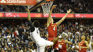 Nov 15, 2016; Washington, DC, USA; Maryland Terrapins guard Kevin Huerter (4) block Georgetown Hoyas guard Jagan Mosely (4) shot second half at Verizon Center. Maryland Terrapins defeated Georgetown Hoyas 76-75. Mandatory Credit: Tommy Gilligan-USA TODAY Sports