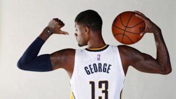 Sep 28, 2015; Indianapolis, IN, USA; Indiana Pacers forward Paul George (13) poses for a photo during media day at Bankers Life Fieldhouse. Mandatory Credit: Brian Spurlock-USA TODAY Sports