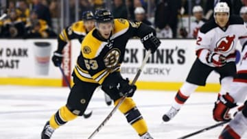 Nov 10, 2014; Boston, MA, USA; Boston Bruins center Seth Griffith (53) lets go a shot against the New Jersey Devils during the third period of Boston