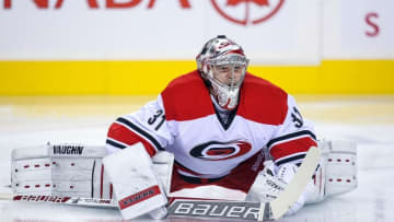 Oct 23, 2014; Calgary, Alberta, CAN; Carolina Hurricanes goalie Anton Khudobin (31) during the warmup period against the Calgary Flames at Scotiabank Saddledome. Calgary Flames won 5-0. Mandatory Credit: Sergei Belski-USA TODAY Sports