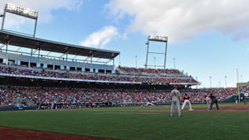 Omaha, NE - JUNE 26: Pitcher Luke Heimlich #15 of the Oregon State Beavers delivers a pitch in the third inning during game one of the College World Series Championship Series against the Arkansas Razorbacks on June 26, 2018 at TD Ameritrade Park in Omaha, Nebraska. (Photo by Peter Aiken/Getty Images)