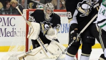 Oct 16, 2014; Pittsburgh, PA, USA; Pittsburgh Penguins goalie Marc-Andre Fleury (29) makes a save against the Dallas Stars during the third period of an NHL game at Consol Energy Center. Dallas won 3-2. Mandatory Credit: Don Wright-USA TODAY Sports