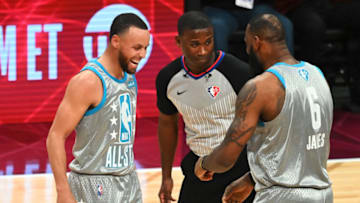 CLEVELAND, OHIO - FEBRUARY 20: Stephen Curry #30 and LeBron James #6 of Team LeBron celebrate after defeating Team Durant 163-160 during the 2022 NBA All-Star Game at Rocket Mortgage Fieldhouse on February 20, 2022 in Cleveland, Ohio. NOTE TO USER: User expressly acknowledges and agrees that, by downloading and or using this photograph, User is consenting to the terms and conditions of the Getty Images License Agreement. (Photo by Jason Miller/Getty Images)