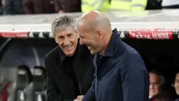MADRID, SPAIN - MARCH 01: Quique Setien, Head Coach of Barcelona shakes hands with Zinedine Zidane, Manager of Real Madrid prior to the Liga match between Real Madrid CF and FC Barcelona at Estadio Santiago Bernabeu on March 01, 2020 in Madrid, Spain. (Photo by Gonzalo Arroyo Moreno/Getty Images)