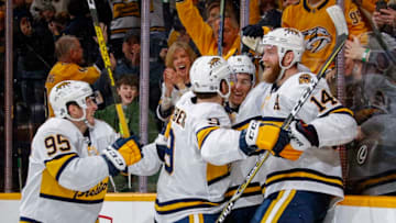 NASHVILLE, TENNESSEE - FEBRUARY 16: Kyle Turris #8 of the Nashville Predators is congratulated by teammates Matt Duchene #95, Filip Forsberg #9 and Mattias Ekholm #14 after scoring the go-ahead goal against the St. Louis Blues during the final two minutes of the third period at Bridgestone Arena on February 16, 2020 in Nashville, Tennessee. (Photo by Frederick Breedon/Getty Images)