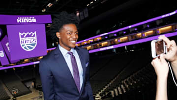 SACRAMENTO, CA - JUNE 24: The Sacramento Kings 2017 Draft Pick De'Aaron Fox poses for a photo on June 24, 2017 at the Golden 1 Center in Sacramento, California. NOTE TO USER: User expressly acknowledges and agrees that, by downloading and/or using this Photograph, user is consenting to the terms and conditions of the Getty Images License Agreement. Mandatory Copyright Notice: Copyright 2017 NBAE (Photo by Rocky Widner/NBAE via Getty Images)